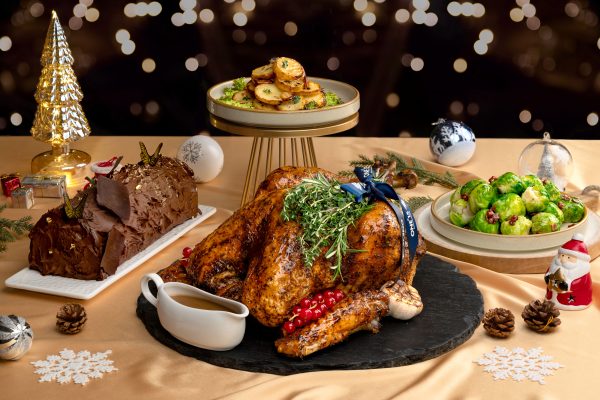 The iconic Whole Roasted Turkey is the centerpiece of the celebration and promises to satisfy every palate. Complete the Christmas feasting with Brussels Sprouts with Pancetta, and Classic Scalloped Potatoes. Polish off the meal with the Classic Dark Chocolate Log Cake.