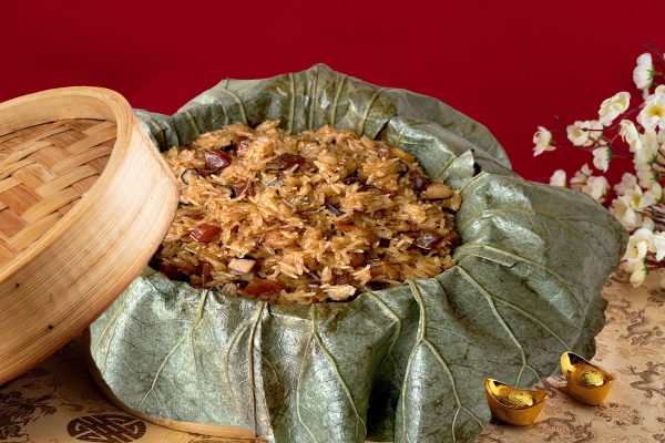 Fried Glutinous Rice with Assorted Preserved Meats in Lotus Leaf 荷叶腊味糯米饭