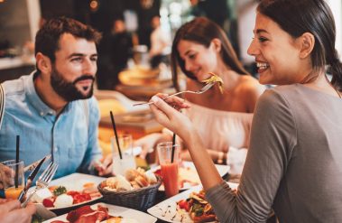 Group,Of,Happy,Friends,Having,Breakfast,In,The,Restaurant