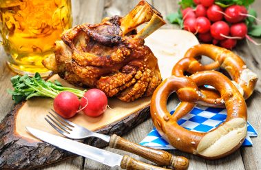 Roasted,Pork,Knuckle,With,Pretzels,And,Beer.,Oktoberfest,Menu