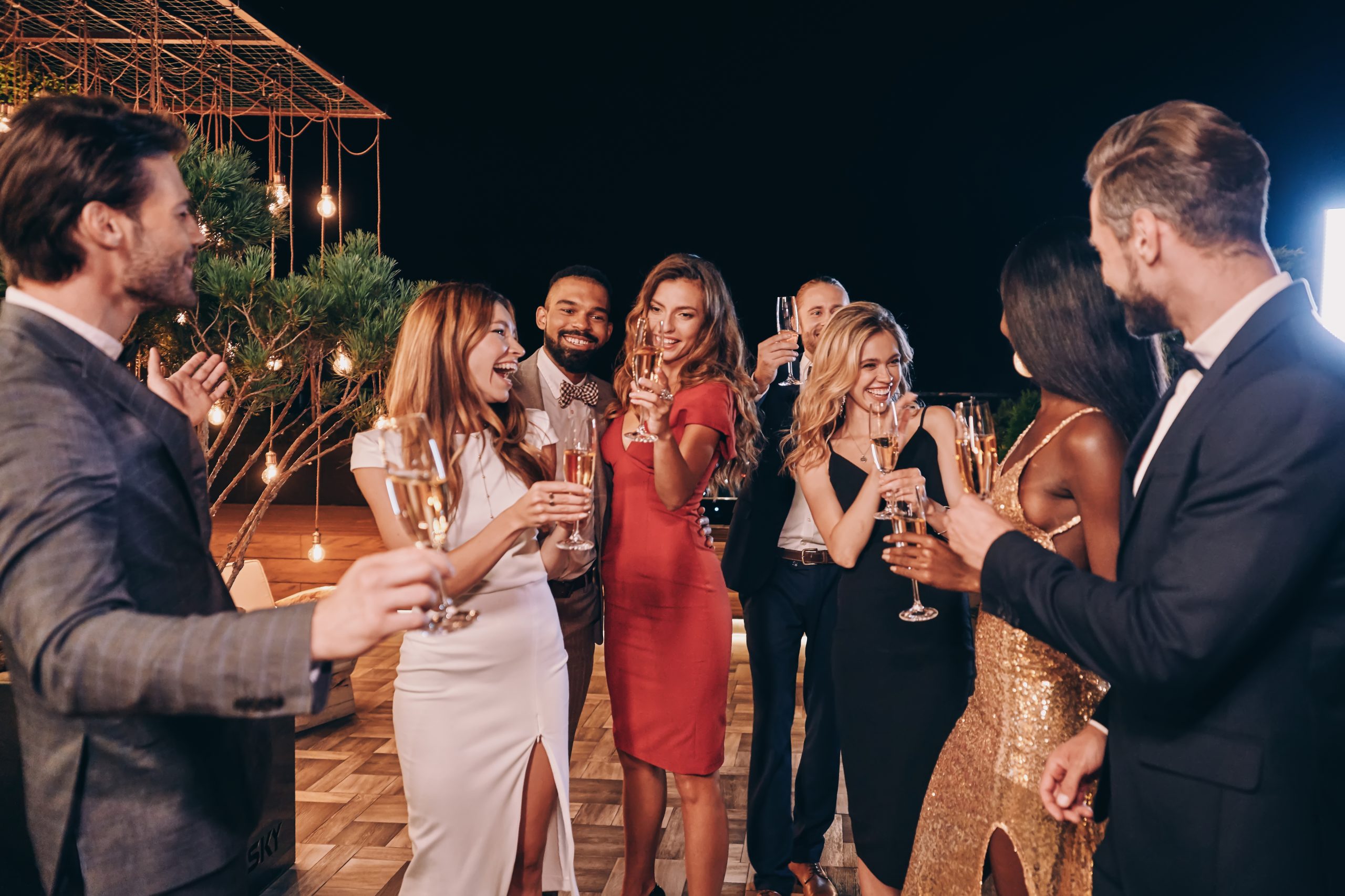 Group,Of,Beautiful,People,In,Formalwear,Communicating,And,Smiling,While