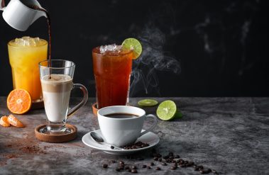 Latte,,Americano,,Orange,Juice,,Lime,Tea,Served,On,Dark,Background.